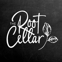 The Root Cellar Village Green Grocer at McKenzie Corner logo